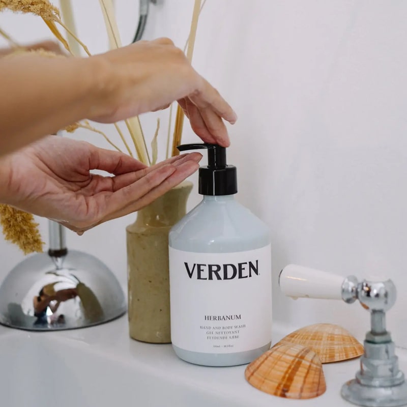 Verden Herbanum Hand And Body Wash - Product shown being dispensed in models hand