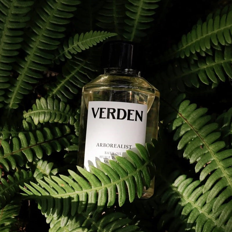 Verden Arborealist Bath Oil - Product shown on top of plants