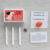 Marvling Bros Ltd Your Fire Can Light The World Mindfulness Gift showing contents of matchbox all spread out