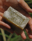 Bathing Culture Mind and Body Bar - Cathedral Grove (4.58 oz) - Product displayed in model's hands. 