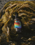 Bathing Culture Kelp Forest Shampoo - Break Water lifestyle shot, product shown with seaweed. 