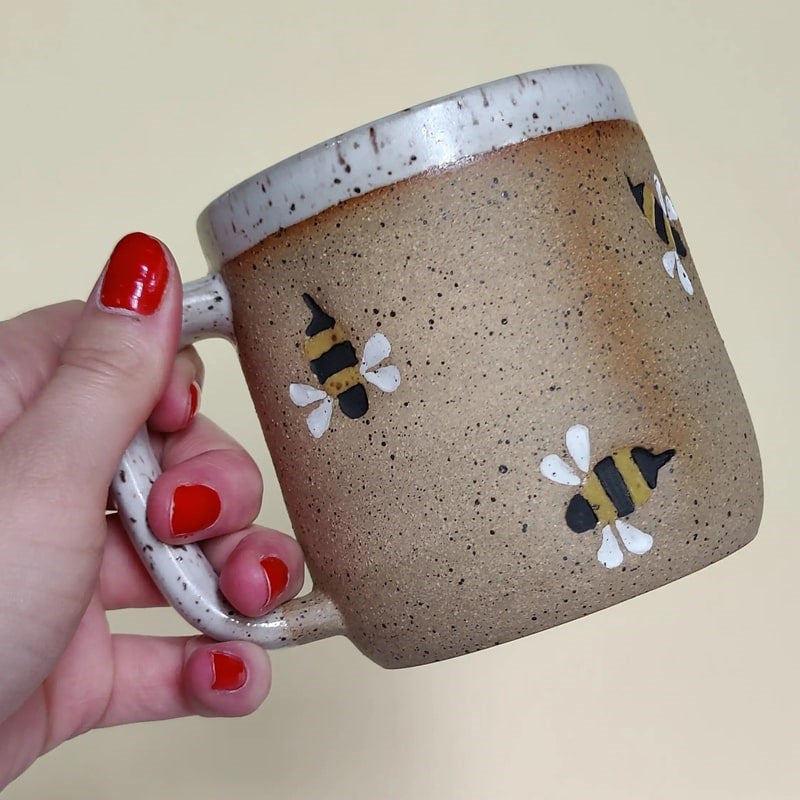 Osso Ceramics Bumble Bee Stamped Mug - Product shown in models hand