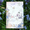 Moth & Myth North American Insect Watercolor Kit - Product displayed on flowers