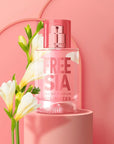 Solinotes Paris Freesia Eau de Parfum - Beauty shot, product displayed next to flower