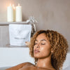 Bathorium Emerald Detox Clay Mineral Soak - Model shown in bath