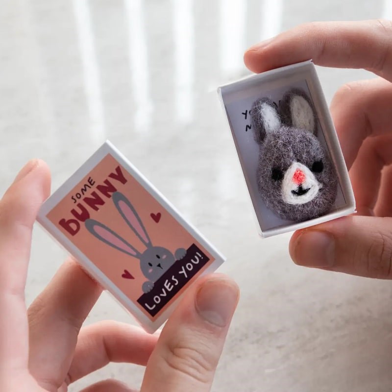 Marvling Bros Ltd Some Bunny Loves You Wool Felt Rabbit In A Matchbox - Product shown in models hands