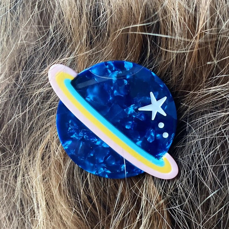 Lisa Junius Saturn Hair Clip - Product shown in models hair