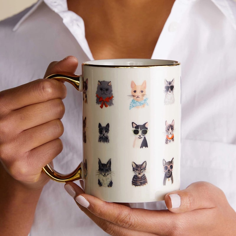 Rifle Paper Co. Porcelain Mug - Cool Cats in model's hands showing size perspective