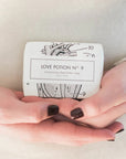 Formulary 55 Love Potion No. 9 Bath Bar - Product shown in models hands