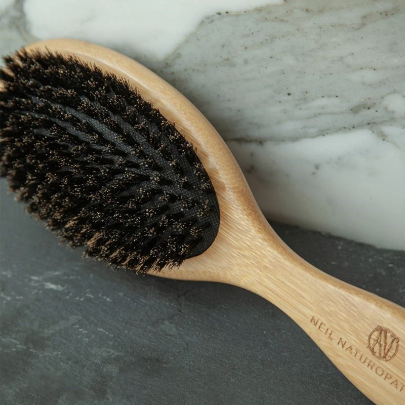 Neil Naturopathic Boar Bristle Brush - Product displayed on marble