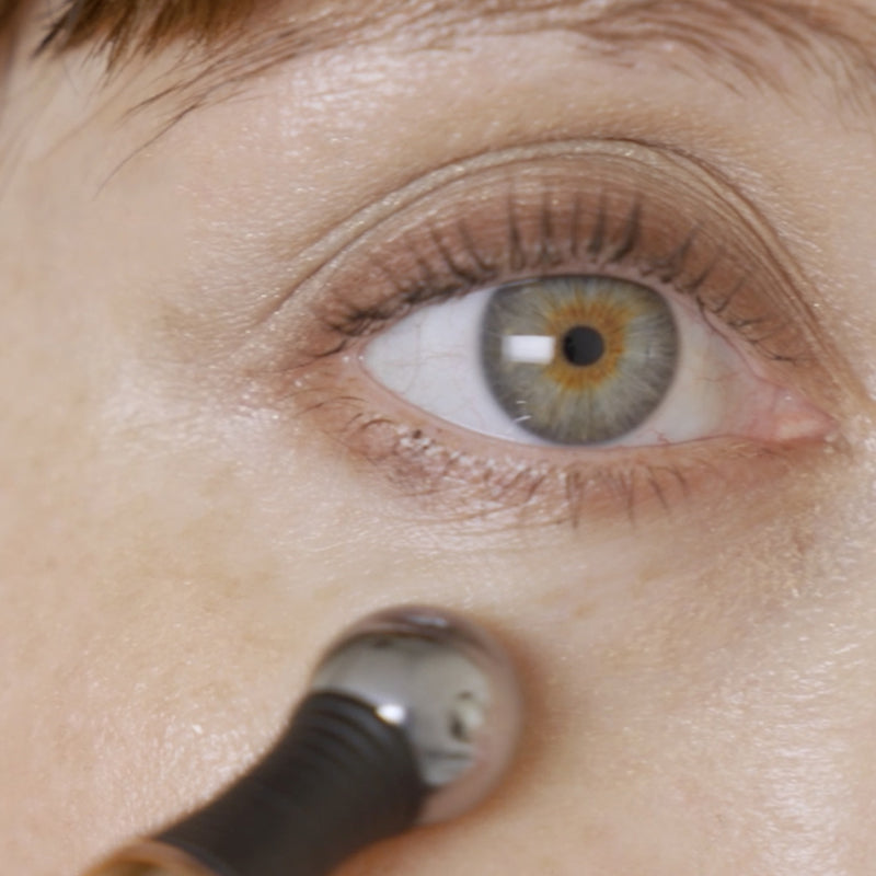 Odacite Cryo-Tech Facial Tool - Model shown using product under eye