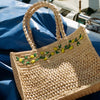 Soame Embroidered Bag – Gino - Product shown on blanket