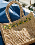 Soame Embroidered Bag – Gino - Product shown on blanket