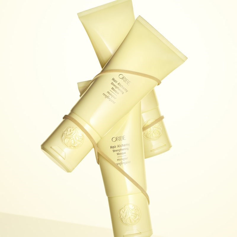 Oribe Hair Alchemy Strengthening Masque - Product shown stacked on top of each other