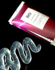 R+Co Teleport Flexible Control Hydra Glee - Product smear shown next to product