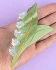 Coucou Suzette Lily of the Valley Hair Claw - Product shown in models hand