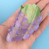 Coucou Suzette Grape Hair Claw - Product shown in models hand