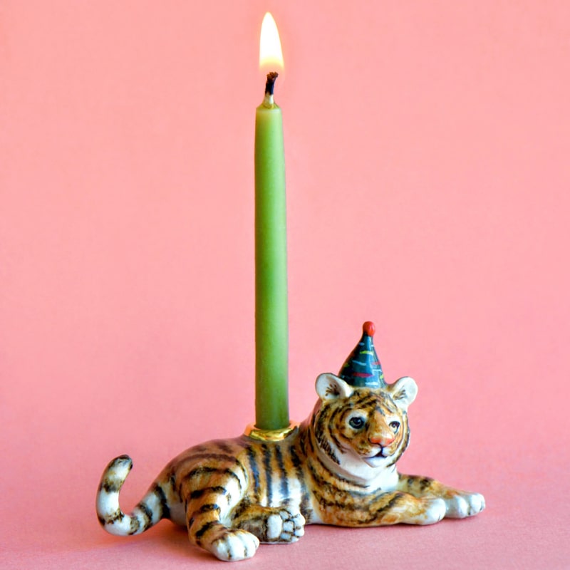 Camp Hollow Year of the Tiger Cake Topper - Product shown with lit candle