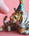 Camp Hollow Year of the Tiger Cake Topper - Product shown next to models finger