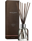 Molton Brown Delicious Rhubarb & Rose Aroma Reeds - Product shown next to box