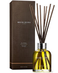 Molton Brown Re-Charge Black Pepper Aroma Reeds Diffuser - Product displayed next to box