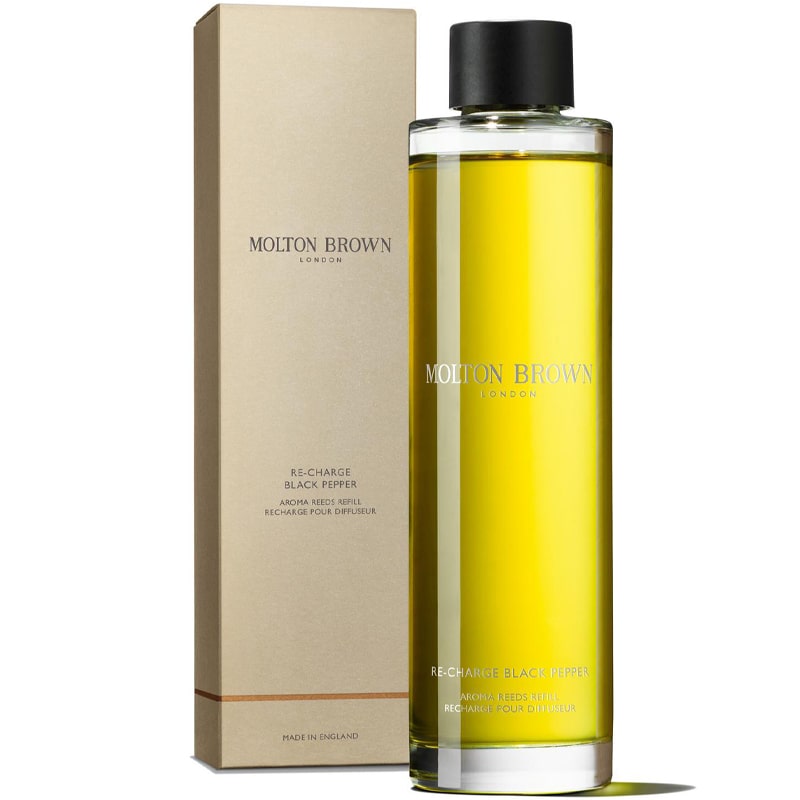 Molton Brown Re-Charge Black Pepper Aroma Reeds Refill - Product shown next to box