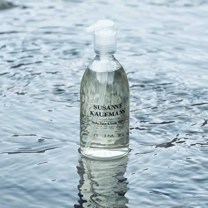 Susanne Kaufmann Body, Face &amp; Scalp Wash - Product displayed on water background