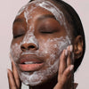 Odacite Jojoba Pearls Daily Hydra-Exfoliant - Model shown with product applied to face