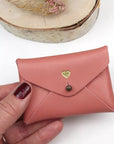 Barnabe Aime Le Cafe Mini Leather Heart Pouch – Pampa - Product shown in models hand