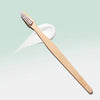 Davids Premium Bamboo Toothbrush - Product shown on top of toothpaste smear