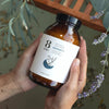 8 Days Botanicals Serenity Botanical Bath Soak - Product shown in models hand