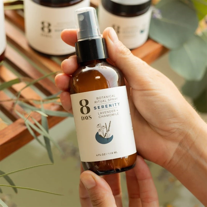 8 Days Botanicals Serenity Botanical Room Spray - Product shown in models hand