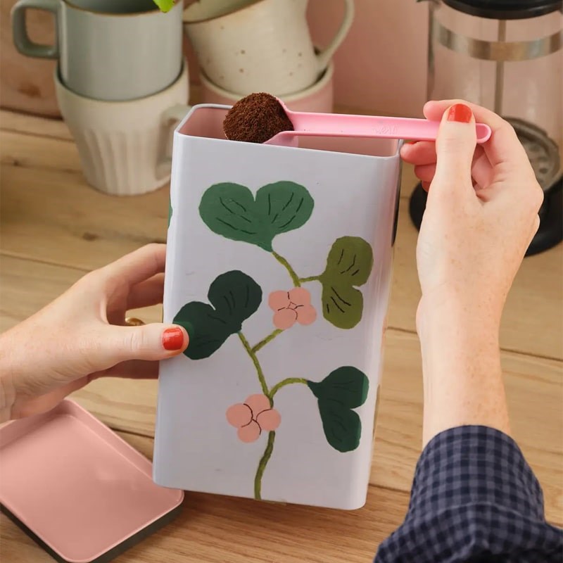 Wrap Ginkgo Coffee Tin - Product shown in models hands