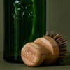 Koala Eco Scrubbing Brush - lifestyle of product and bottle