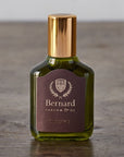 Bernard Parfum Cleome Roll On Parfum Ol Bijou - Product displayed on wood table