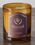 Bernard Parfum Cleome Candle - Product displayed on wood table