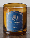 Bernard Parfum Meli Candle - Product displayed on wood table
