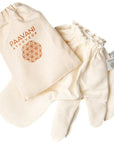 PAAVANI Ayurveda Garshana Gloves – Small/Medium - Product displayed next to bag