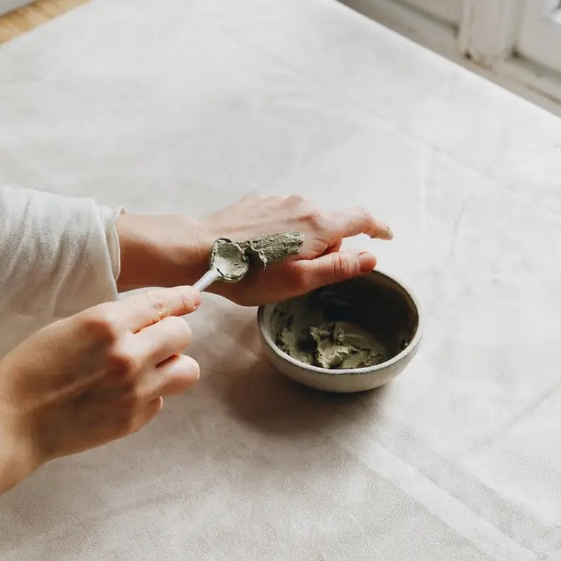 Floragy Refresh – Matcha + Mint Clay Mask - Model shown applying product to hand