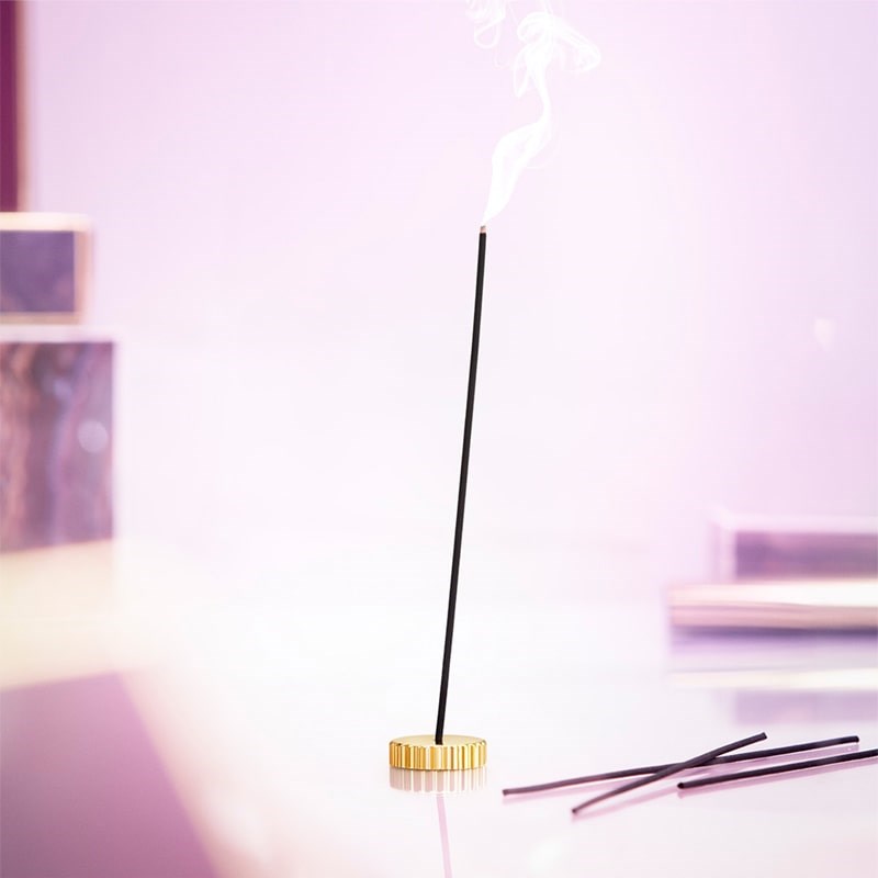 Oribe Valley of Flowers Incense- Product shown in stand