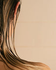 Pelegrims Shampoo and Conditioner Travel Duo Set - Closeup of model with wet hair