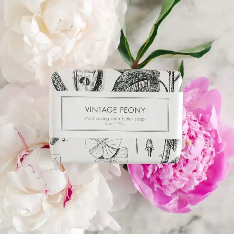 Formulary 55 Vintage Peony Bath Bar - Packaged soap on top of peony flowers