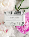 Formulary 55 Vintage Peony Bath Bar - Packaged soap on top of peony flowers