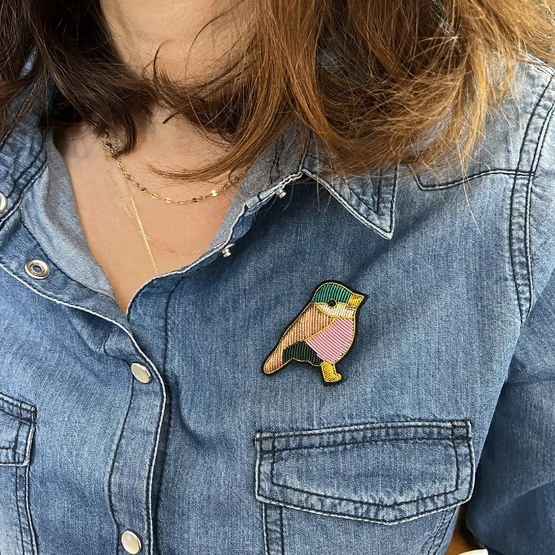 Barnabe Aime Le Cafe Bird Brooch - Model shown wearing product on shirt