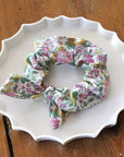 Barnabe Aime Le Cafe Liberty Hair Scrunchie - Rosalie - Product shown on top of ceramic dish