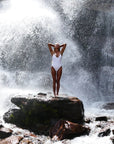 ISUN Eshin Scalp & Hair Serum - Lifestyle photo of model near a waterfall