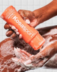 Kosas Good Body Skin Body Wash - Lifestyle shot of model using the product