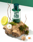 Solinotes Vetiver Eau de Parfum - Beauty shot product shown on piece of bark 
