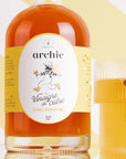 Les Abeilles de Malescot Cider Vinegar with Honey- Product shown next to full glass