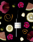 Penny Frances Apothecary Estelle Body Oil - Product shown with fruit and flowers
